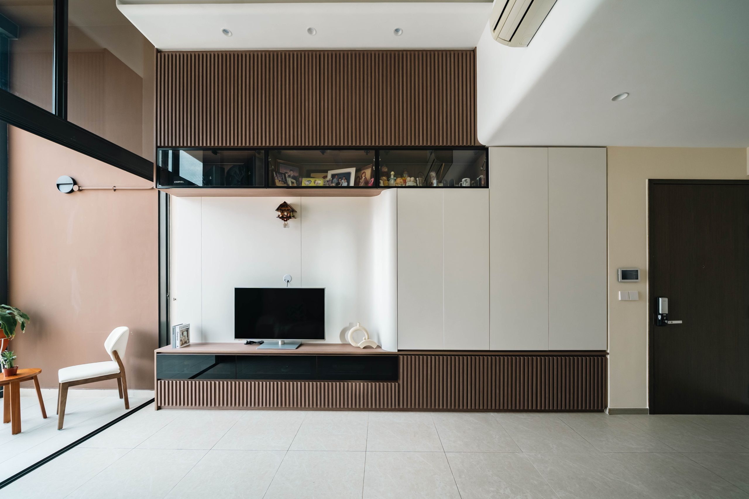 Double-height living area at iNz Residence designed by 9Creation